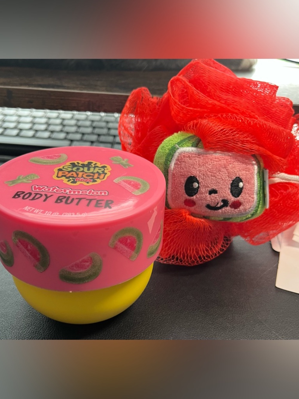 Sour Patch Kids Watermelon Body Butter and a cocomelon scrubby- watermelon.
